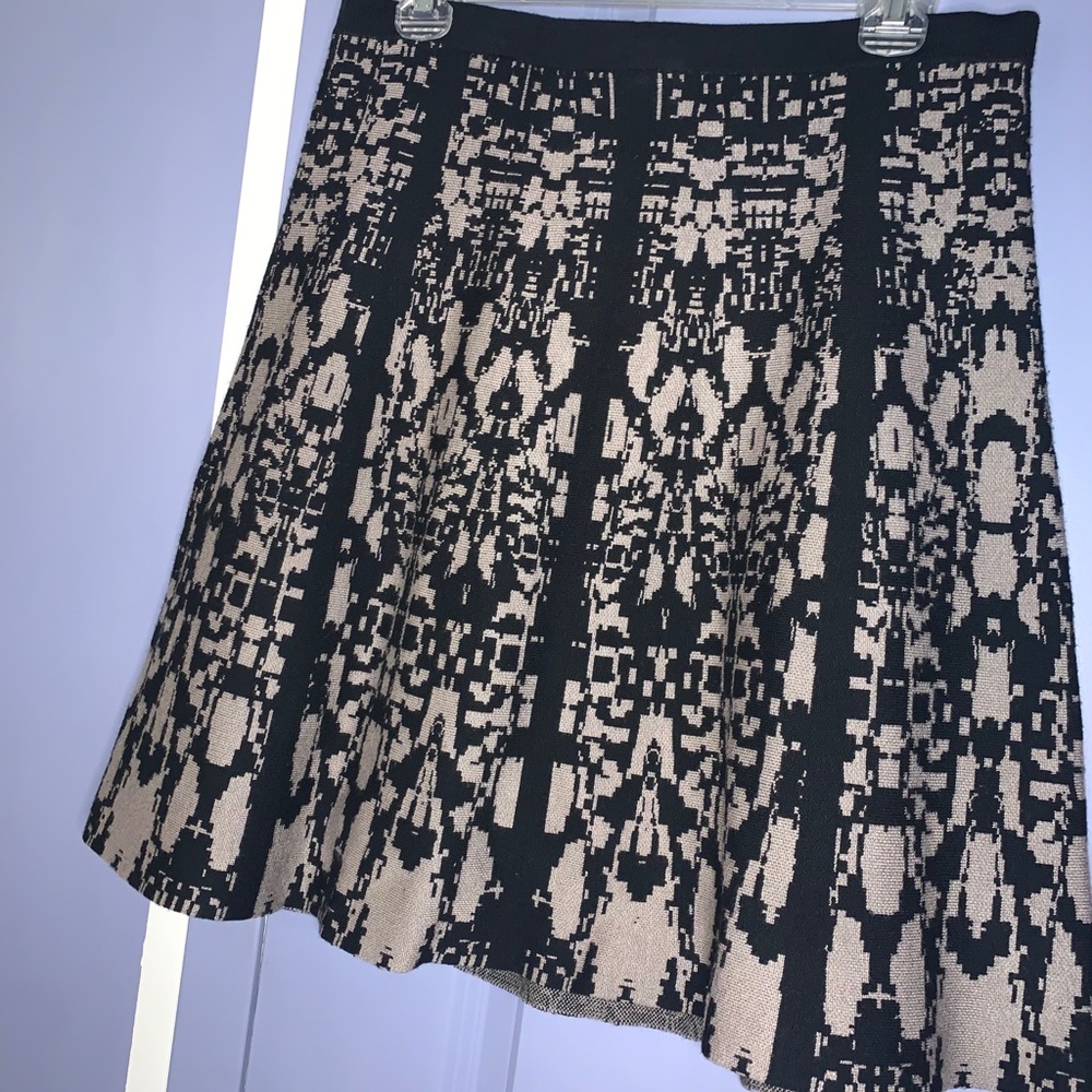 Patterned flared knit skirt.